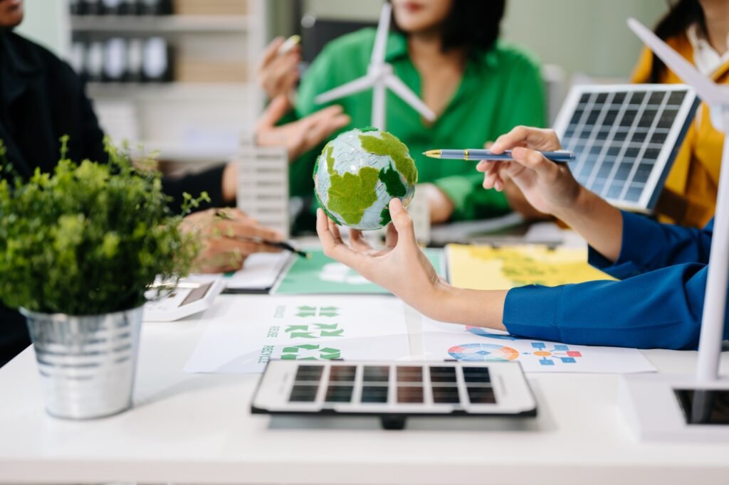 Business team working virtual modern smartphone to reduce CO2 emissions carbon footprint