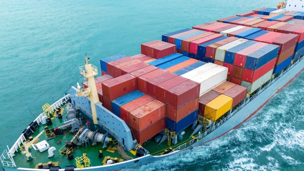 front view Cargo Container ship the ocean ship carrying container and running for import export