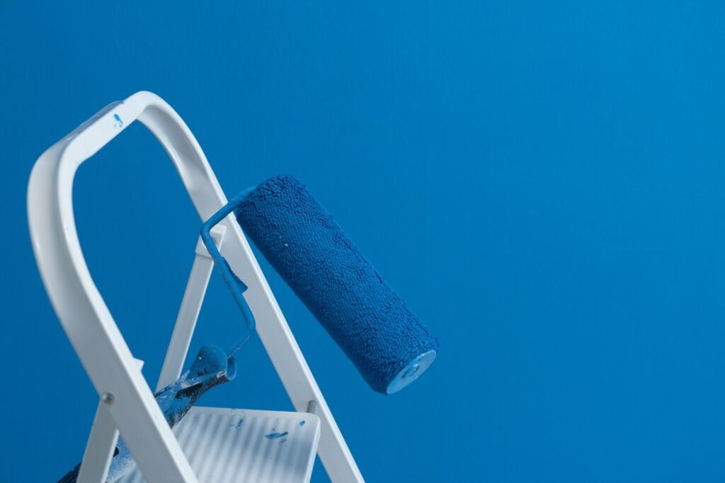 Someone painting wall