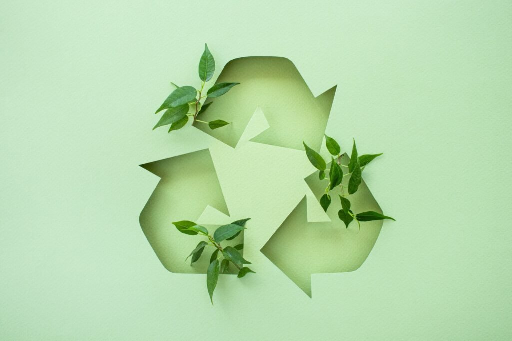 Symbol of waste recycling with green leaves. environmental protection concept. Recycle Icon Environm